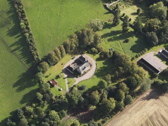 General oblique aerial view of Ardovie House estate, centred on  Ardovie House, taken from the NW.
