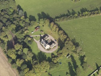 General oblique aerial view of Ardovie House estate, centred on  Ardovie House, taken from the SW.