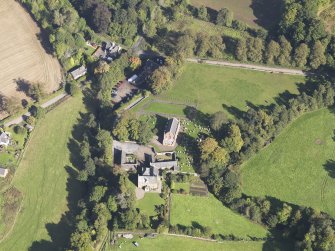 General oblique aerial view of Farnell Village, centred on Farnell Parish Church, taken from the SSW.