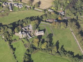 General oblique aerial view of Farnell Village, centred on Farnell Parish Church, taken from the S.
