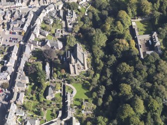 General oblique aerial view of the Skinner's Burn area of Brechin, centred on Brechin Cathedral, taken from the W.