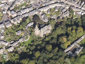 General oblique aerial view of the Skinner's Burn area of Brechin, centred on Brechin Cathedral, taken from the SSW.