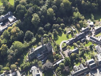 General oblique aerial view of the Skinner's Burn area of Brechin, centred on Brechin Cathedral, taken from the NE.