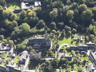 General oblique aerial view of the Skinner's Burn area of Brechin, centred on Brechin Cathedral, taken from the NNW.