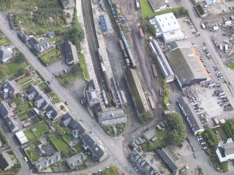 General oblique aerial view of Brechin Railway Terminus, centred the ticket office, taken from the W.