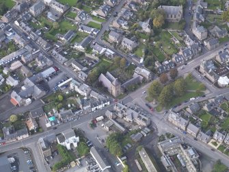 General oblique aerial view of Damacre Road, Brechin, centred the Gardner Memorial Church, taken from the E.