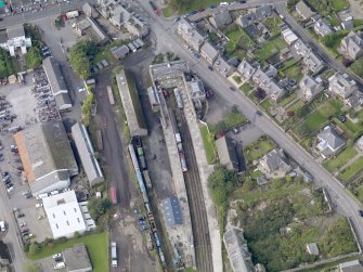 General oblique aerial view of Brechin Railway Terminus, centred the ticket office, taken from the E.