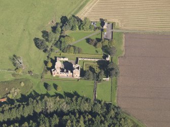 General oblique aerial view of Edzell Castle estate, centred on Edzell Castle, taken from the SW.