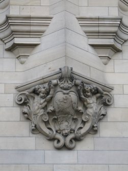 View of facade of 1 Market Street, showing Royal Arms of Scotland and putti with cartouche.