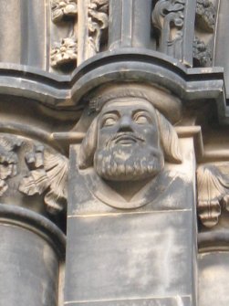 View of head of Sir David Lindsay of the Mount, at top of pilaster on S side (facing S).