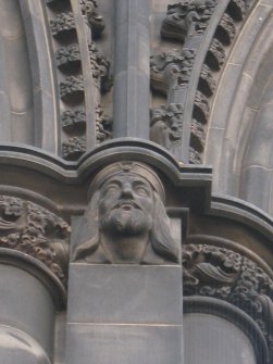 View of head of King James I, at top of pilaster on N side (facing N).