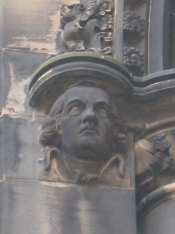 View of head of Tobias Smollett, at top of pilaster on E side (facing N).