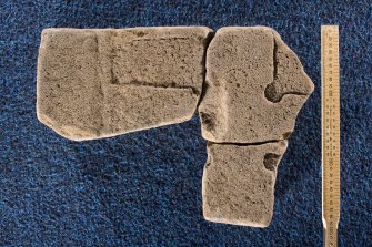 View of reverse faces of fragments (Drainie 8 and Drainie 3) showing cross (with scale)