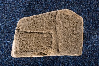 View of reverse face of fragment (Drainie 8) showing part of cross