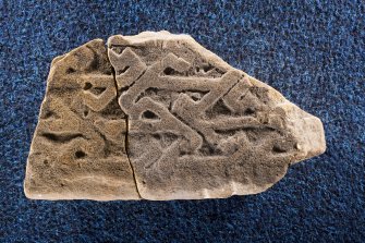 View of fragment of cross slab Drainie no 25, with Drainie no 27