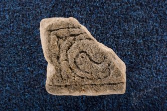View of fragment of cross slab, Drainie no 29, with spiral decoration