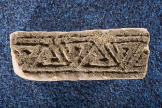 View of edge of fragment, Drainie no 22, with triangular key pattern