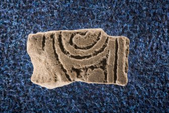 View of cross-slab fragment with spiral decoration