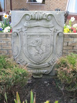 View of stone carved with a lion rampant, beside entrance to Ferryfield House.