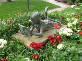View of sculpture 'Girl Reading'.