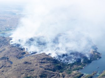 General oblique aerial view of the wild fire on the Ardnish peninsula, taken from the NE.