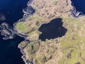 Oblique aerial view centred on Loch na h-Airde, the 'Viking Canal’ and Rubh' an Dunain, taken from the E.