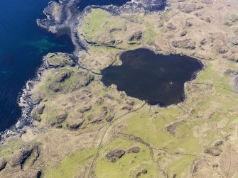 Oblique aerial view centred on Loch na h-Airde, the 'Viking Canal’ and Rubh' an Dunain, taken from the ENE.