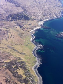 General oblique aerial view centred on the remains of the township and dun at Boreraig, taken from the W.