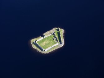 Oblique aerial view of Lochindorb Castle, taken from the SW.