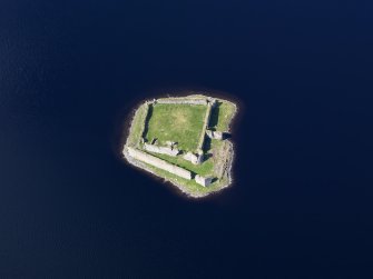 Oblique aerial view of Lochindorb Castle, taken from the ESE.