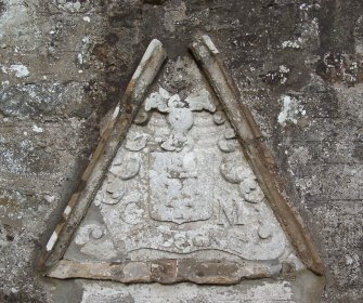 Conzie Castle: armorial panel (1674) in Forgue kirkyard