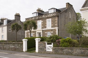 View of 22 and 23 Ardbeg Road, Ardbeg, Rothesay, Bute, showing stone balustrade at roofline