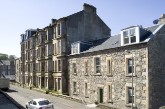 View of 12, 14 and 16 Castle Street, Port Bannatyne, Bute, from SE, also including two-storeyed terrace at 10 Castle Street, Port Bannatyne, Bute, to E