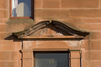 Detail of broken pediment above doorway at 17 Battery Place, Rothesay, Bute