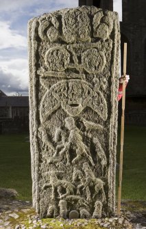 View of rear of Pictish cross slab at Elgin Cathedral (with scale)