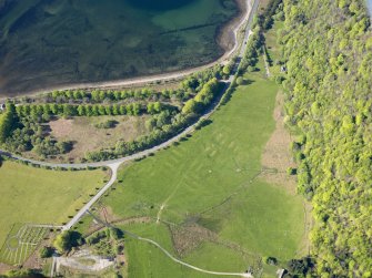 Oblique aerial view of the remains of the Shire Camp, Combined Operations Training Centre, and the Loch Dhu avenue, taken from the NE.