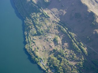 Oblique aerial view of the buildings at High Morlaggan under excavation, taken from the SW.