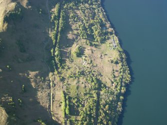 Oblique aerial view of the buildings at High Morlaggan under excavation, taken from the NE.