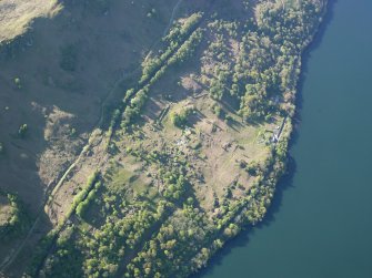Oblique aerial view of the buildings at High Morlaggan under excavation, taken from the N.
