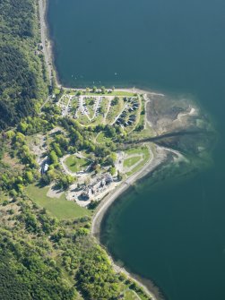 Oblique aerial view of Ardgartan House and caravan park, taken from the SW.