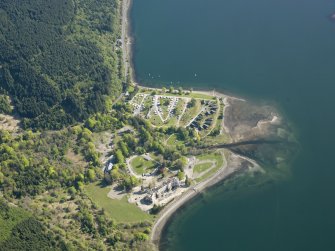 Oblique aerial view of Ardgartan House and caravan park, taken from the SW.