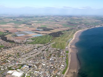 General oblique view of Leven, centred on Scoonie Municipal Golf Course to left and Leven Links Golf Course to right, taken from the SW.