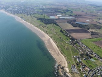 Oblique aerial view of Lundin Links Golf Course, with Leven Links and Scoonie Municipal courses beyond and Lundin Ladies course to right, taken from the E.