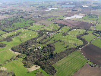 Oblique aerial view of Charleton Golf Course and Charleton House policies, taken from the NE.