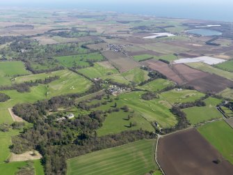 Oblique aerial view of Charleton Golf Course and Charleton House policies, taken from the WNW.