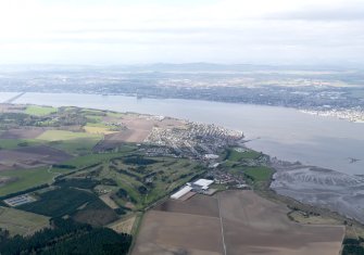 General oblique aerial view of the Tay Estuary centred on Scotscraig Golf Course, taken from the SE.