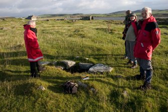 I Parker (RCAHMS) and volunteers visit the St Ninian's Point west well.