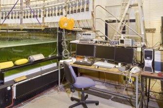 Interior. Curved wave tank building. Curved Wave Tank and control desk
