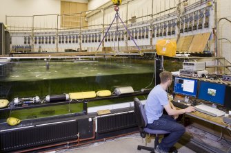 Interior. Curved wave tank building. Curved Wave Tank and Control desk