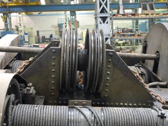 Interior. Crane 1 demoition: view of cross traveller main pulley wheels
